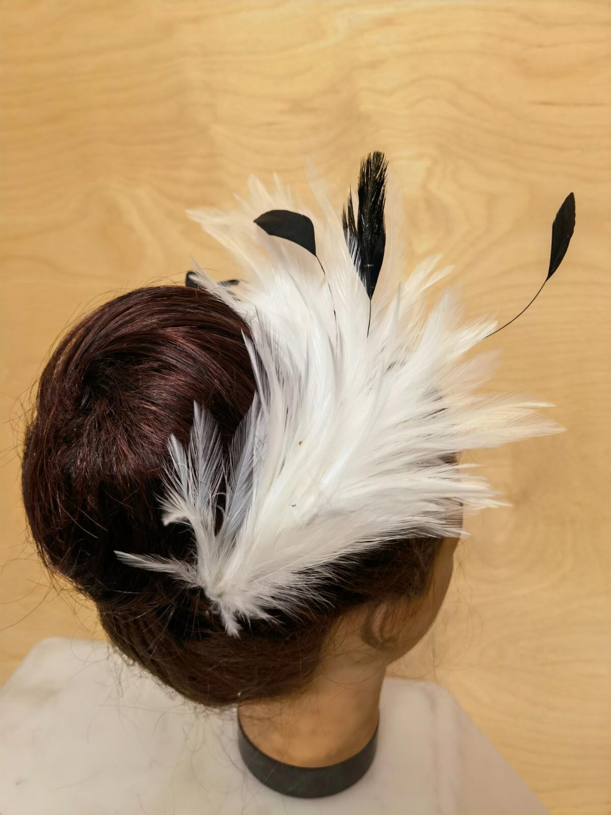 white feather comb fascinator millinery wedding hat