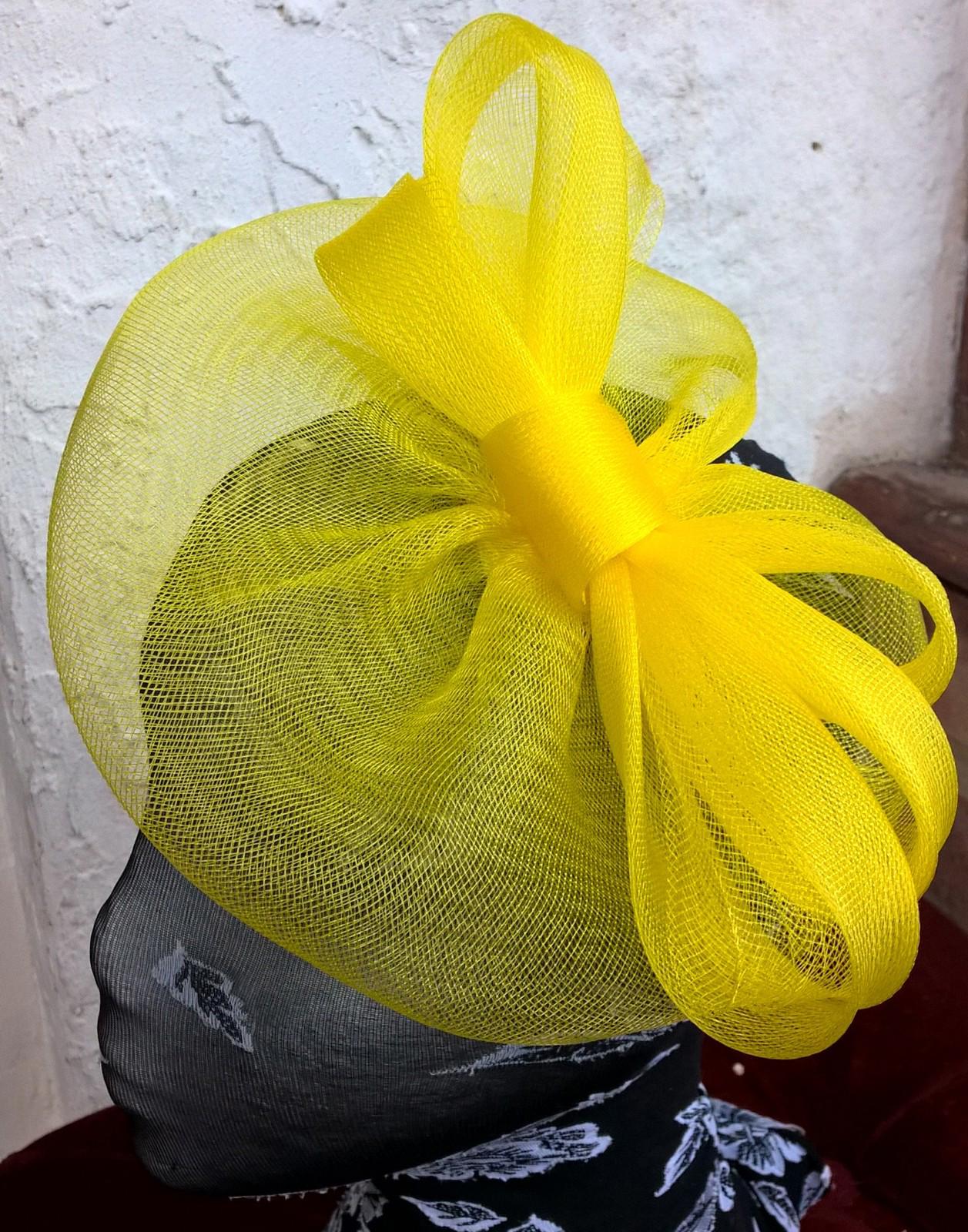 bright yellow fascinator millinery burlesque wedding hat ascot race bridal