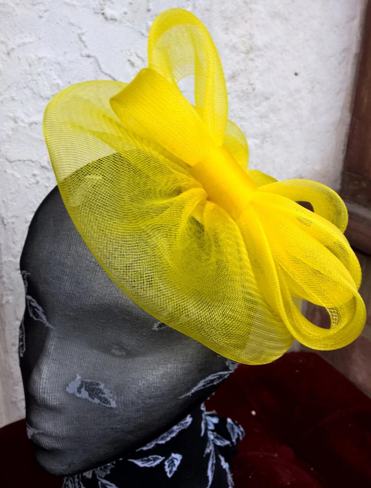 bright yellow fascinator millinery burlesque wedding hat ascot race bridal