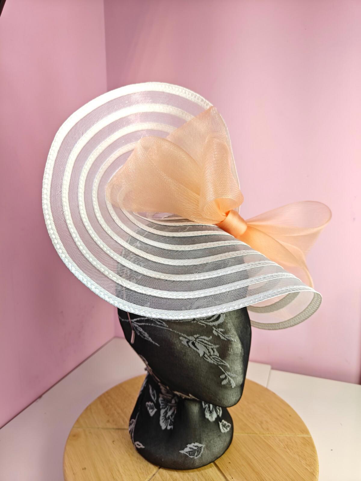 white peach bow fascinator millinery wedding hat Kentucky Derby Royal Ascot